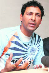 Harendra Singh speaks to the media in New Delhi on Thursday. 