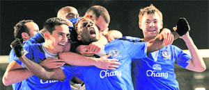 Evertons Louis Saha (C) celebrates after scoring his second goal against Chelsea on Wednesday.