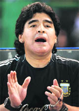 Argentina's coach Diego Maradona applauds before their friendly match against Jamaica in Mar del Plata on Thursday.