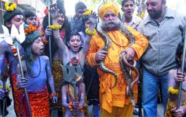 Devotees celebrate Shiv Vivah on Mahashivratri on the Khajana Gate road in Amritsar