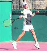 A player in action at the 10th Uttarakhand State Open Junior Championship in Dehradun on Friday.