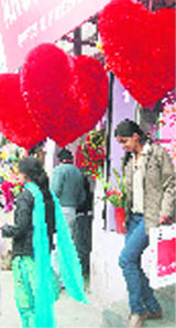 With Valentines Day just a day away, this girl comes out of a shop happily after selecting her pick for the D-day.