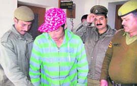 Accused in police custody.