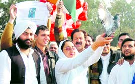 On the eve of Valentines Day, Socialistic Democratic Party chief Darakshan Andrabi releases a pigeon carrying a message of love and peace to Pakistan, on the border on Saturday