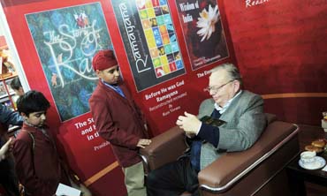 Author Ruskin Bond signs books for students