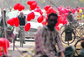 HEARTS’ DAY OUT: Balloon sellers throng a road on Valentine’s Day in Chandigarh.