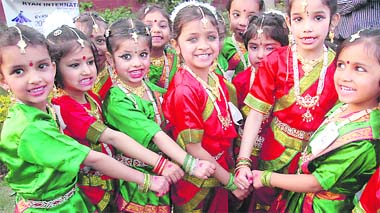 Students of Ryan International School perform a cultural item at carnival on the school campus in Sector 49, Chandigarh, on Sunday. 