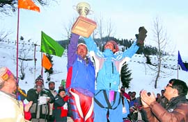 HPWGA president RC Negi gives away prize to the winning team at Solang ski slopes, near Manali on Friday