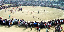 A large crowd watches a kabaddi game during the annual rural games in Muthada village on Sunday.