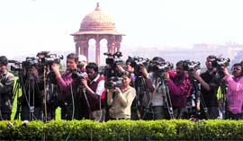 Mediapersons gather outside the Home Ministry in New Delhi on Sunday