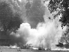 Army personnel blow up a dustbin containing suspected boxes in Ambala Cant on Monday.