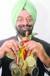 Gurjiwan Singh Sidhu with his medals