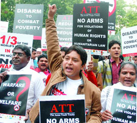 Activists of NGOs participate in a peace march in New Delhi on Monday. They demanded regulating transfer of conventional weapons and supported the 2006 United Nations decision on drafting an Arms Trade Treaty to promote responsible transfer of weapons globally