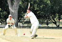A batsman tries to hit a shot at the SC Memorial Cricket Tournament in Dehradun