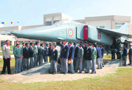 Students update themselves on a MIG 23 aircraft that has been installed at Sainik School, Kunjpura.
