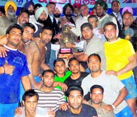 The winners of the UK Gold Cup Kabaddi strike a pose at Jagraon