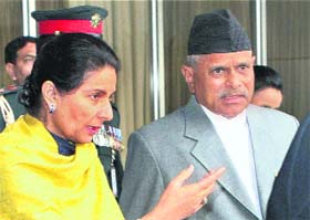 Nepal President Ram Baran Yadav being welcomed by Minister of State for External Affairs Preneet Kaur on his arrival at Indira Gandhi International Airport in New Delhi on Monday.