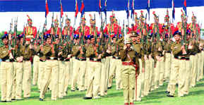 The girls regiment of the Delhi police marches at its 63rd Raising Day Parade at the NPL Ground, Kingsway Camp, New Delhi, on Tuesday.