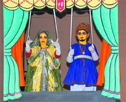 Students dressed as puppets perform at a function at DIPS in Jalandhar.