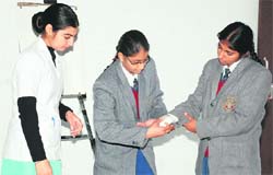 Students get practical training in first aid at Doraha Public School on Tuesday.