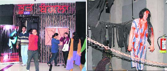 Youngsters come out after having a deadly experience; and (right) a ghost inside the Haunted House at a mall in Ludhiana.