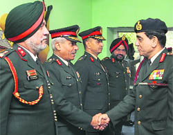 Chief of the Army Staff, Gen Deepak Kapoor, being greeted by officers on his arrival at Chandimandir on Monday.