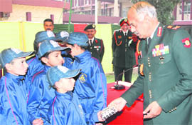 Lt-Gen SR Ghosh, GOC-in-C, Western Command, gives away gifts to children from J&K, who were in Chandigarh