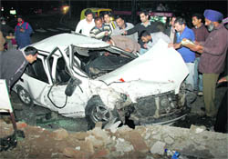 The car which rammed into the roundabout separating Sectors 18, 19, 20 and 21 in Chandigarh on Wednesday night.