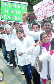 Doctors trained in alternative medicine protest against the Centres move to start a course in rural healthcare, at Jantar Mantar in New Delhi on Wednesday.
