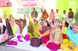 Muslim women members of the minority cell of the Congress stage a protest in Dehradun 