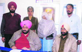 The accused in police custody.
