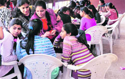Girls hang out at a college canteen.