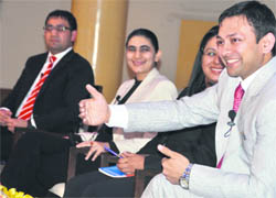 Experts take part in a panel discussion on motivation, professionalism and focus, in Ludhiana on Tuesday. 