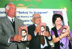 HK Dua, Editor-in-Chief of The Tribune group of publications, along with Governor of Manipur Gurbachan Jagat and senior journalist Reeta Sharma at the release of Sehaj te Sangram - book of Punjabi poetry by late Shaukin Singh, at Chandigarh Press Club on Thursday