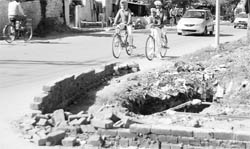 A sewerage manhole on the main road next to the Fortis Hospital and Phase VIII police station is lying open for the past several months. On several occasions commuters had miraculous escape but the Mohali MC and GMADA are not bothered.