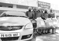 A car that was used by the accused to smuggle poppy husk in police custody at Rajpura on Friday. 
