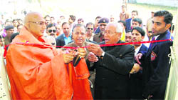 Juna Akhada Peethadeeshwar Swami Awdeshanand with Vice-Chancellor Swatantra Kumar at the inauguration of a squash complex at Gurukul Kangri University in Haridwar