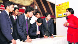 Students at a career and education fair at St Joseph Academy in Dehradun