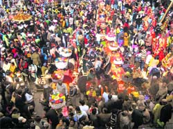 Devotees throng Chota Bazaar in Mandi on the concluding day of the Shivratri fair on Friday. 