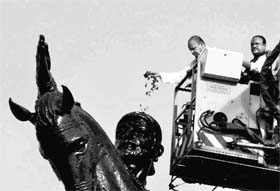 Maharashtra Governor K Sankaranarayanan along with Deputy Chief Minister Chhagan Bhujbal showers petals over the statue of Chhatrapati Shivaji Maharaj on his birth anniversary in Mumbai on Friday.