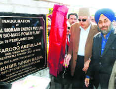 Union Minister Farooq Abdullah and Deputy Chief Minister Sukhbir Badal after inaugurating the biomass-based project in Channu village of Muktsar district on Friday. 