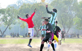 A match in progress at the Narayan Gurung Memorial Football Tournament in Dehradun on Saturday.