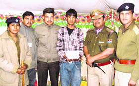 Personnel of the mela police, Mayapur, with the Nepalese accused in Haridwar on Saturday.