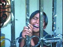 The girl locked up in a room of the marriage palace.