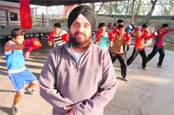 Dr Nirmolak Singh with his trainees in Jammu.