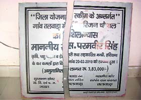 The foundation stone laid by Haryana Agriculture Minister Paramvir Singh in Talwara (Fatehabad) that has been broken into two