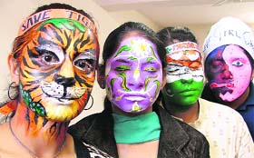 Students of the Khalsa Institute of Management and Technology for Women participate in face-painting contest in Ludhiana