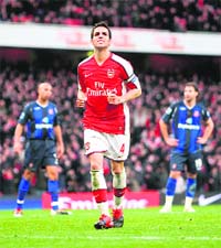 Arsenals Cesc Fabregas celebrates after scoring on Saturday. 