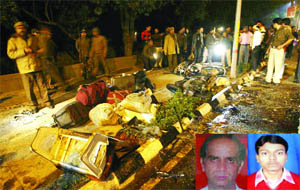 Police personnel inspect the accident site in New Delhi on Sunday.
