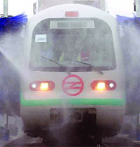 The new-gauge Metro train at the DMRC train depot in Mundka.